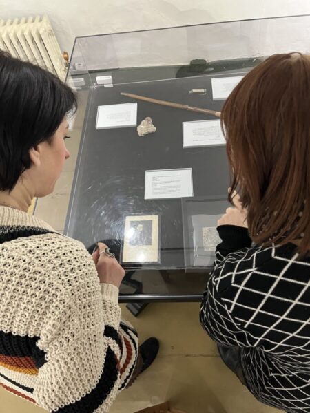 American Independence Museum Staff looking at Indigenous artifacts in collection